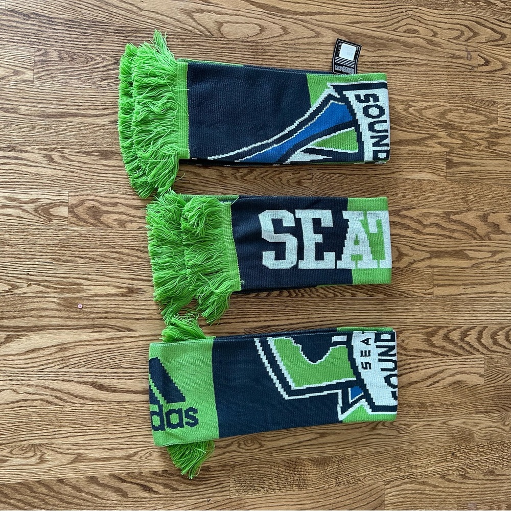 Three new, matching Seattle Sounders scarves.